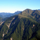 Not so Fast: Slow Erosion and Low-Relief Topography