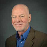 System-wide Considerations for the Production of Hydrocarbon Fuels from Biomass